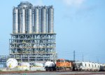 BNSF 5854 rests in the shadow of the massive Corpus Christi Polymers Plant 